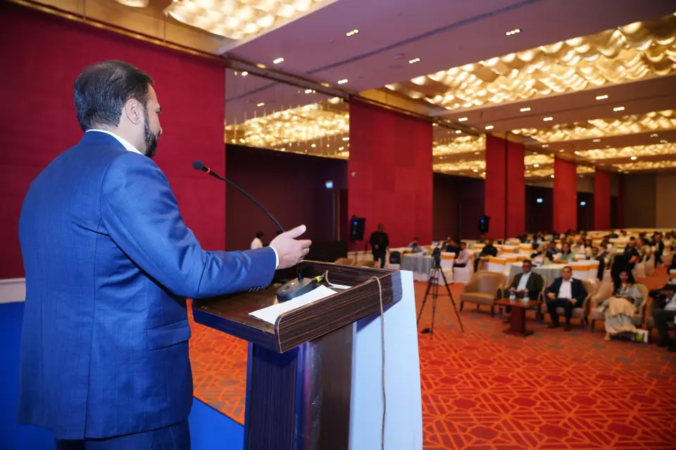Speaker delivering an address in the main hall