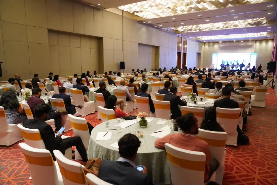 A full main hall during a plenary session