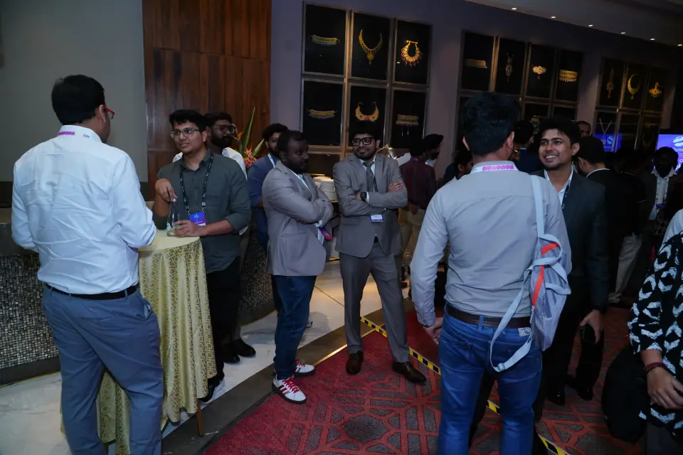 Delegates meeting in the networking lounge