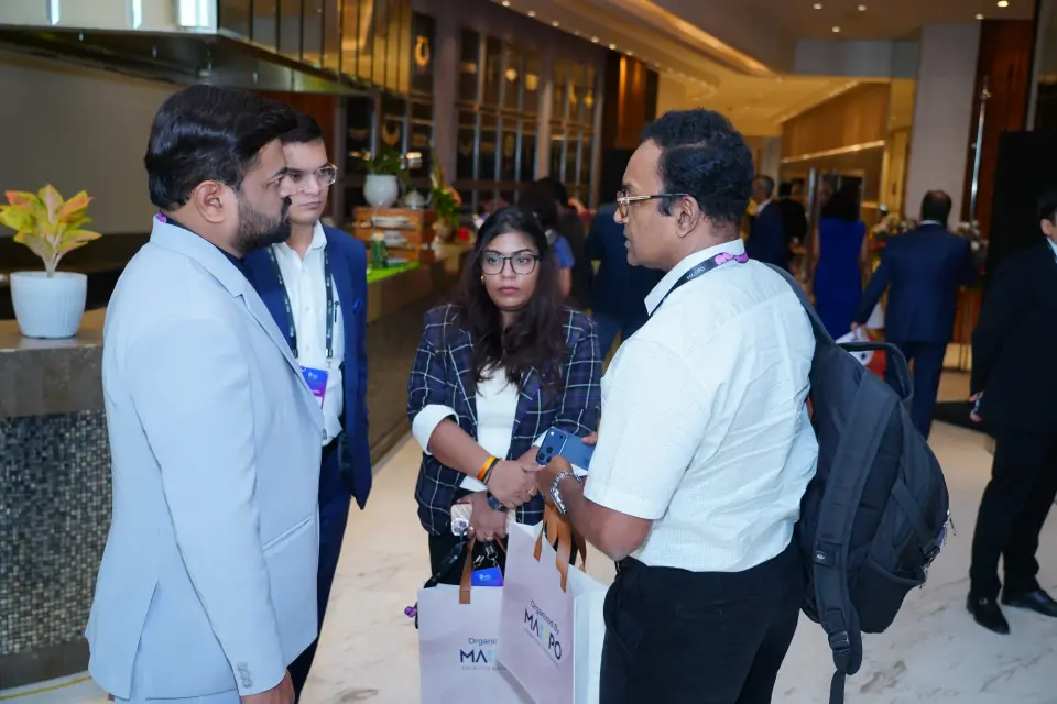 Delegates networking in the foyer