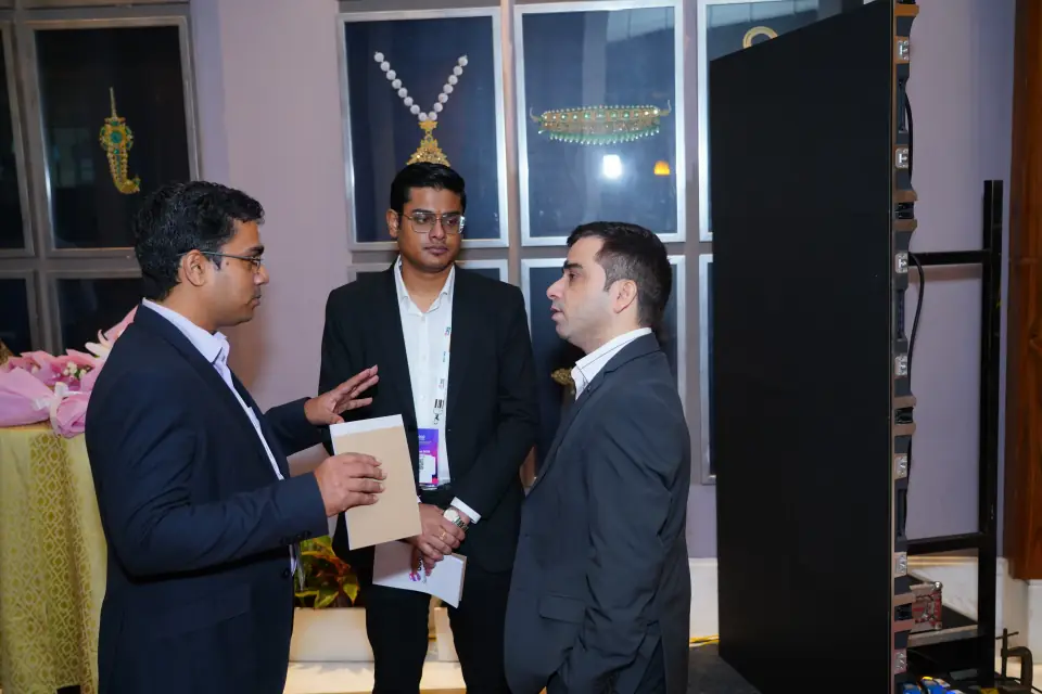 Delegates in conversation between sessions